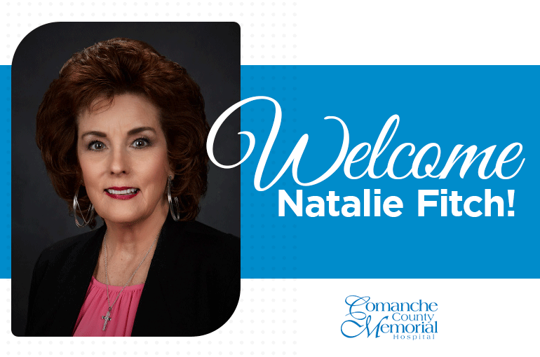 smiling woman with curly coifed brown hair, text reading "Welcome Natalie Fitch" over blue background