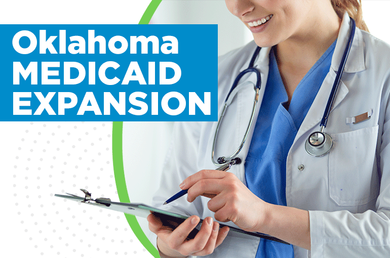 female doctor looking at patient clipboard, "oklahoma medicaid expansion" text on image