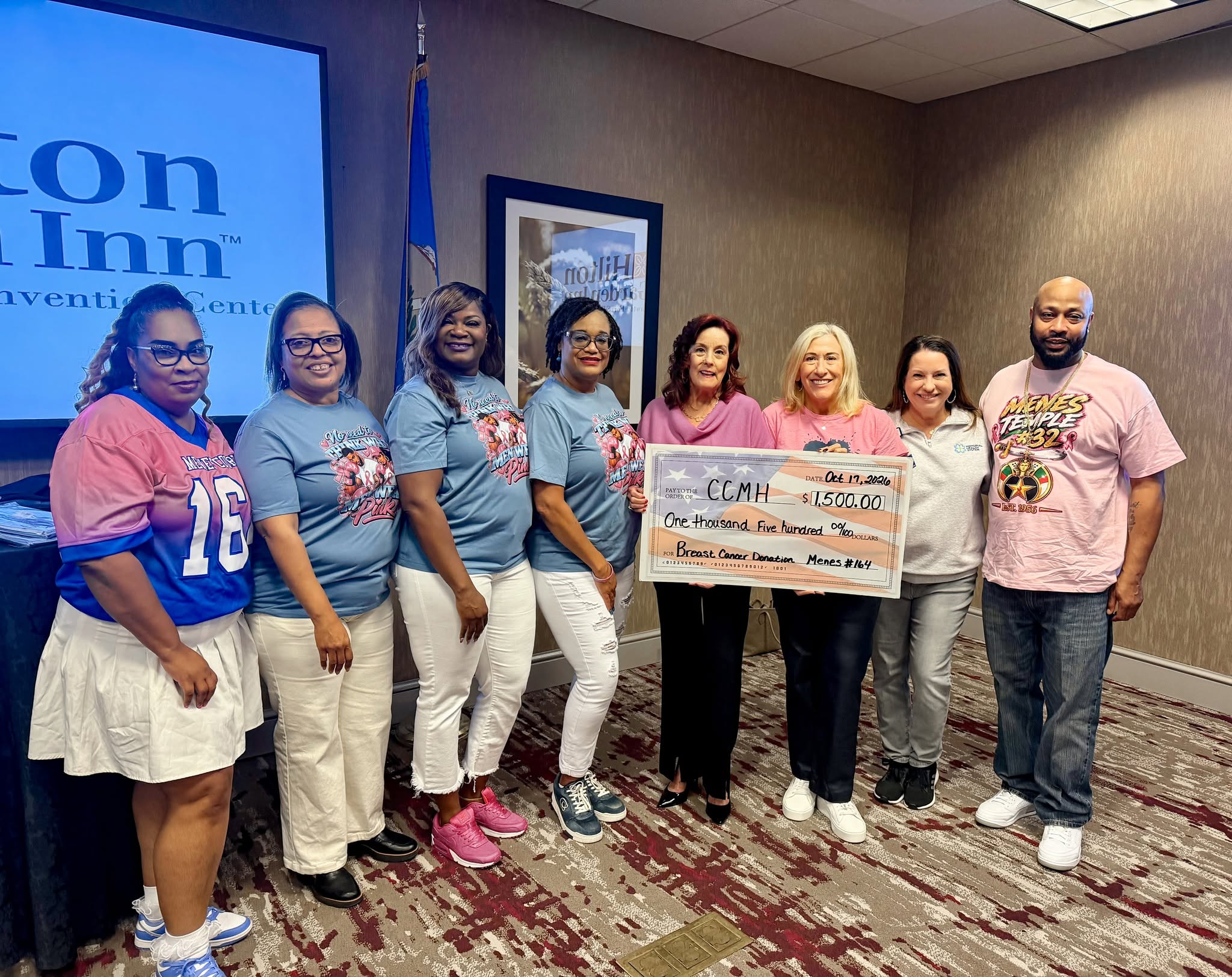 Member of the Memorial Board with women from Menes Court No. 164 with donated check