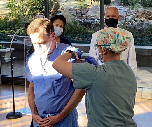 CCMH employee being given new COVID vaccine