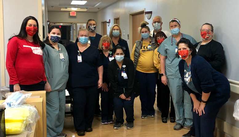 COVID vaccinated CCMH employees posing for picture