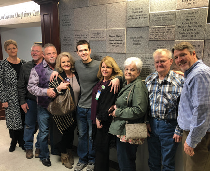 Image of Connie Bryant with friends and family