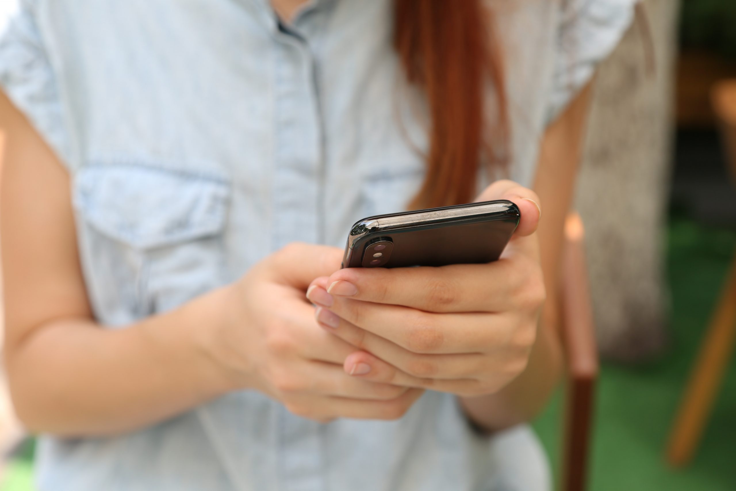 Women holding cell phone